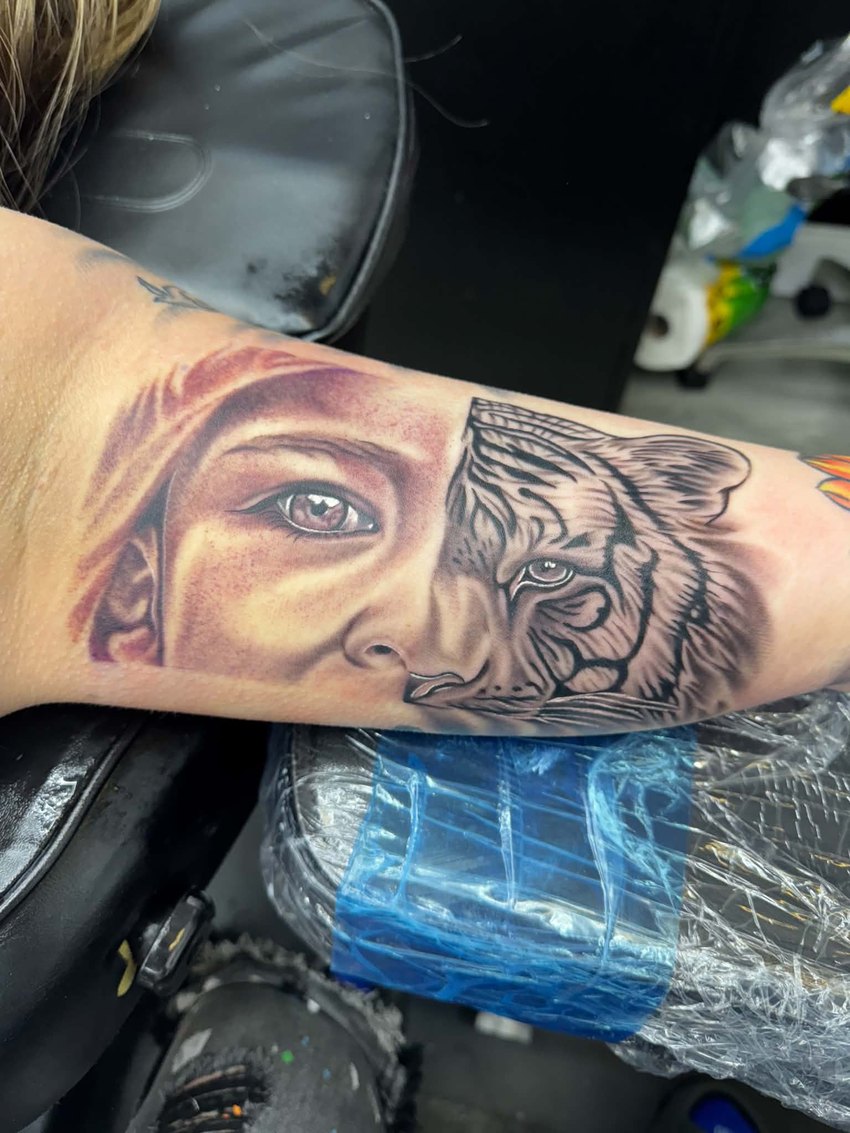 Jesus and lion realism forearm by Todd at Roberts Ink, Marion Ohio